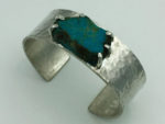 Custom silver cuff bracelet with turquoise stone